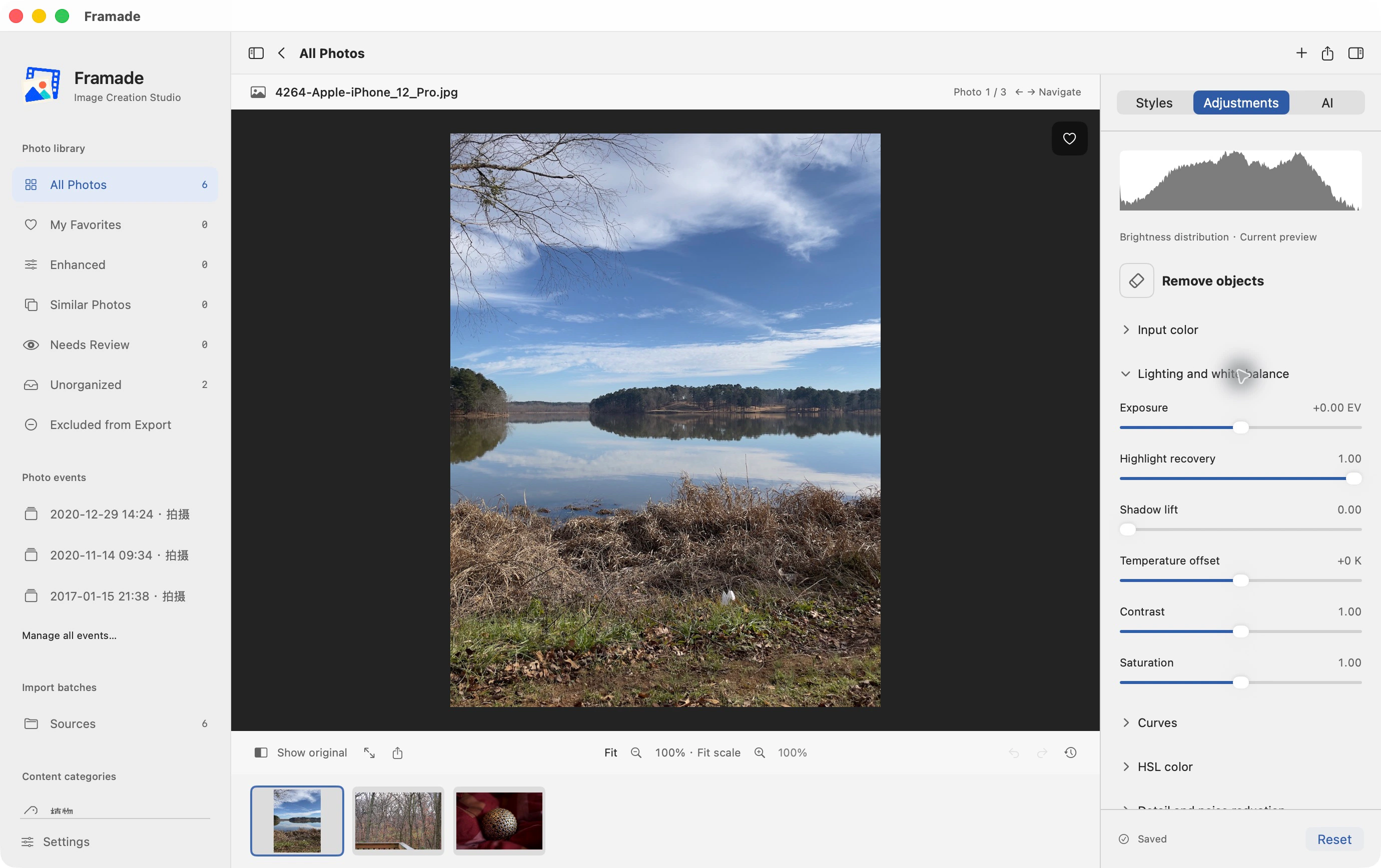 Framade editing workspace in English, showing the image canvas, histogram and light controls